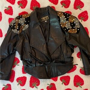 Twins leather jacket in size small black with animal print and rhinestones